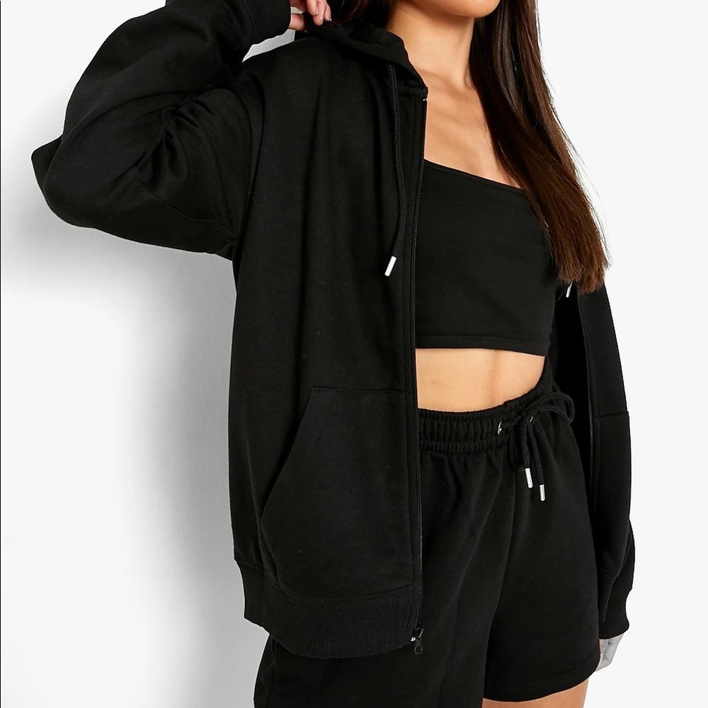 Brand new black zip up hoodie